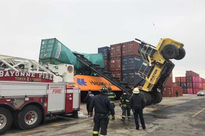 Firefighters Extricate Crane Operator When Machine Topples In Bayonne