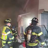 <p>Danbury firefighters work a gas-fed kitchen fire.</p>