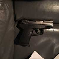 <p>Police found a 9mm handgun concealed just below the steering column in the car.</p>