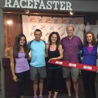 <p>Aidan Walsh, second from left, and his employees during the grand opening of Racefaster in Ridgewood.</p>