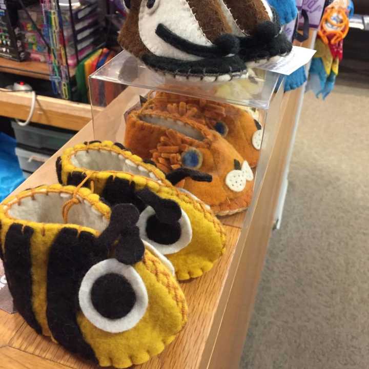 Cute felt baby booties are among the unique items you&#x27;ll find at the Westport Library&#x27;s Holiday Book &amp; Gift Sale this weekend.