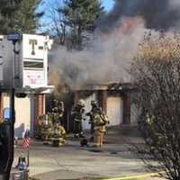 <p>Someone working on a car in one of the units &quot;may have spilled gasoline,&quot; igniting the fire.</p>