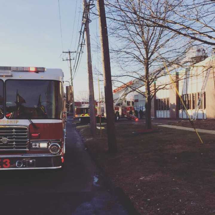 Stratford firefighters respond to a blaze in the ceiling of a commercial building on Garfield Avenue on Saturday morning.