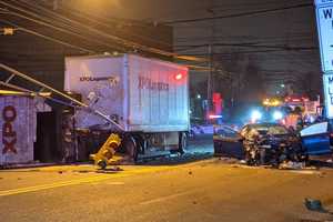 PHOTOS: Sedan Slams Into Tandem Trailer, Topples Light Pole On Busy Road Near Meadowlands