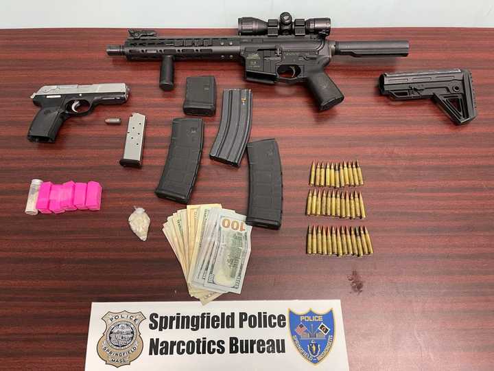 The Springfield Police Department recovered two firearms, including an Assault rifle as well as more than 20 grams of crack-cocaine and more than 350 bags of heroin.