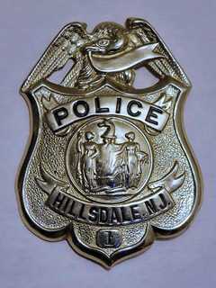 Raised Car Falls On, Kills Man In Hillsdale