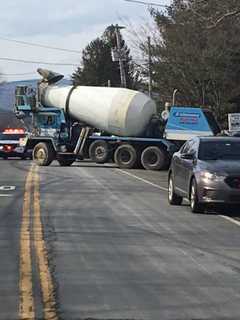 Cement Truck Takes Down Wires On Route 59