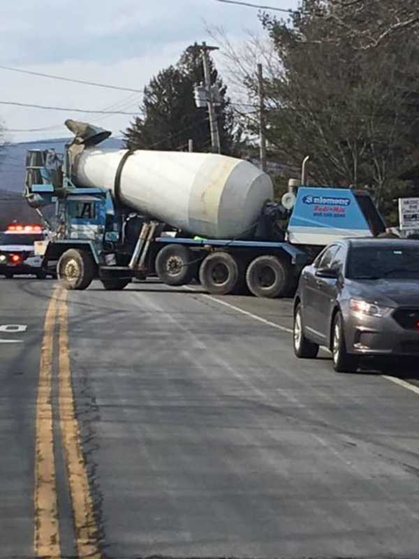Cement Truck Takes Down Wires On Route 59