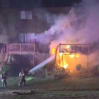 <p>Flames ran the rear wall from the first to the third floor and across the deck</p>