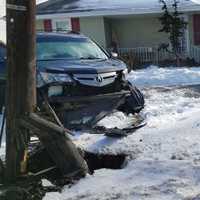 <p>The pole, held by wires, swayed slightly over the roadway.</p>