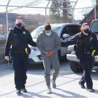 <p>Christopher Luna being taken into custody.</p>