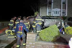 Upper Darby Driver Rescued After Car Rolls Over Onto Funeral Home Front Lawn