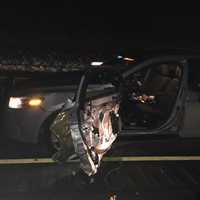 <p>A car driven by a drunken driver slammed into a State Police cruiser on I-95 at the scene of a broken down bus.</p>