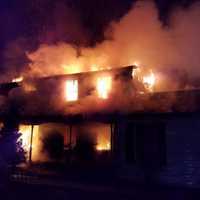 <p>Lake Carmel firefighters worked for hours to knock down a large fire that destroyed a home on Westleigh Road.</p>