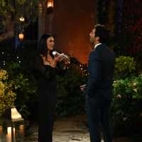 <p>Lauren Hollinger, the older sister, shotguns a beer with Joey Graziadei.</p>