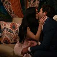 <p>Allie Hollinger, the younger Hollinger sister, steals a kiss from Joey Graziadei on "The Bachelor."</p>