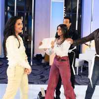 <p>Shriya Jha (holding the board) coaches "American Idol" judge Katy Perry on how to break a board during her audition on an unaired segment on Sunday's show.&nbsp;</p>