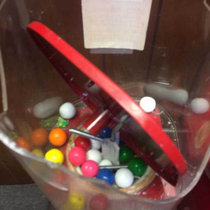 The gumball machine is in pieces after Greenwich firefighters freed a child.