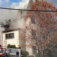 <p>Passaic firefighters battled the High Street blaze from outside.</p>