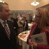 <p>Maureen Porette, a possible candidate for Rockland County Executive, speaks to Preet Bharara, former U.S. attorney for the Southern District of New York.</p>