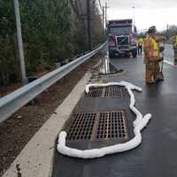 <p>Firefighters clean up Route 208 fuel spill after crash.</p>