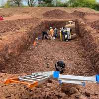 <p>Emergency crews were called to a construction site on Robin Hill Way in Raritan Township shortly after 10:40 a.m. on a report that a soil machine had overturned into a septic system, authorities said.</p>