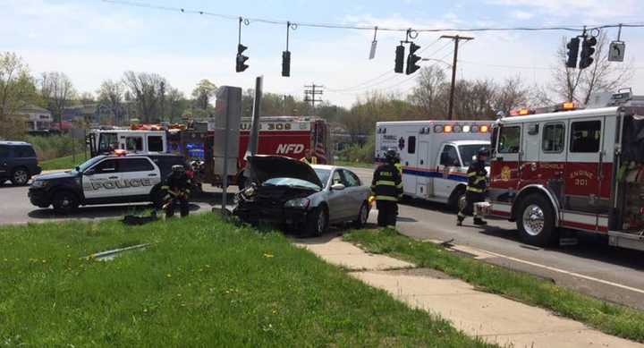 Nichols Fire Department, along with Trumbull police and EMS, respond to a car crash at Nichols Avenue and Hawley Lane.