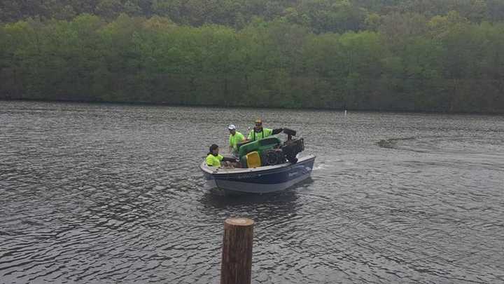 Volunteers gathered trash from the Housatonic River on Saturday.