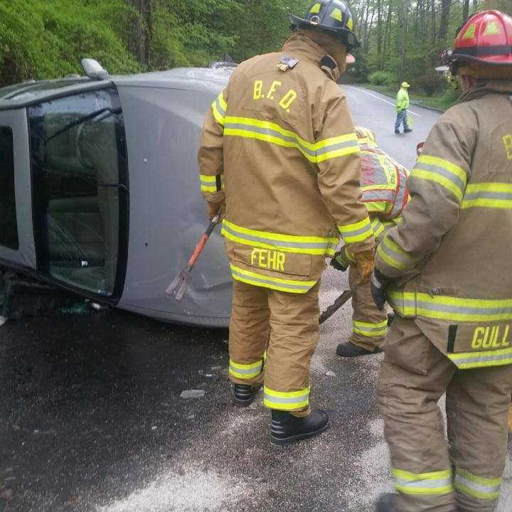 Crews from Bethel respond to an overturned vehicle.