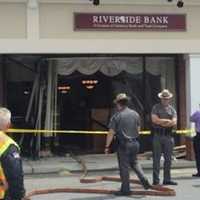 <p>A car plowed through the front of Riverside Bank in the Village of Fishkill causing heavy damage.</p>