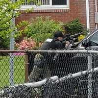 <p>Bergen County Regional SWAT Team sniper positioned.</p>