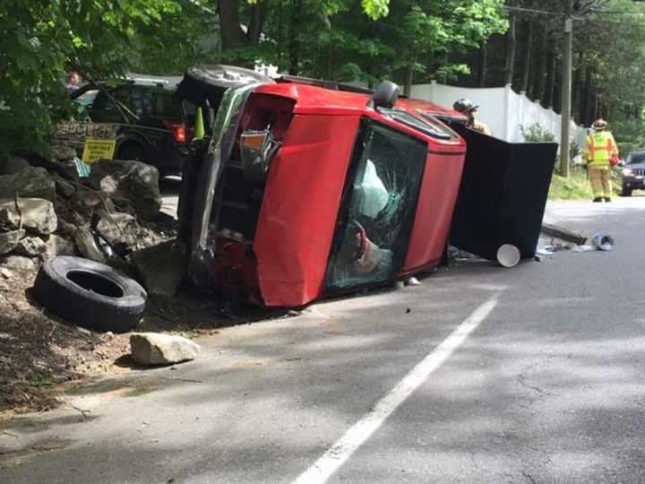 Two people were injured in a two-car crash on Lyons Plains Road in Weston on Saturday.