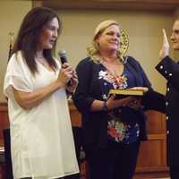 <p>Ridgewood Mayor Susan Knudsen swears Shelby Taylor into the RFD.</p>