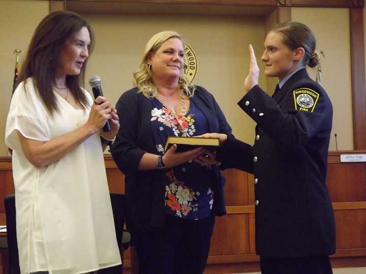 Ridgewood Mayor Susan Knudsen swears Shelby Taylor into the RFD.