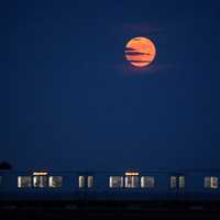 <p>A Strawberry Moon in Washington, D.C. on July 16, 2019.</p>