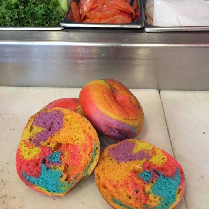 The rainbow bagel at Mount Kisco Bagels is popular with white cream cheese and sprinkles.