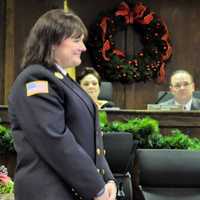 <p>New Jersey Assemblywoman Holly Shepisi presents Kellie Goodell with a resolution on behalf of the state Legislature.</p>