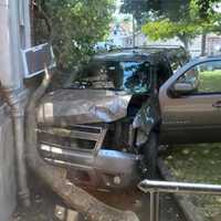 <p>The Chevy Suburban crashed through a fence before slamming into the Washington School building in Saddle Brook.</p>