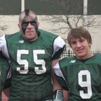 <p>Norwalk residents DJ Morrell, left, and Alex Morsanutto, right at a high school football game.</p>