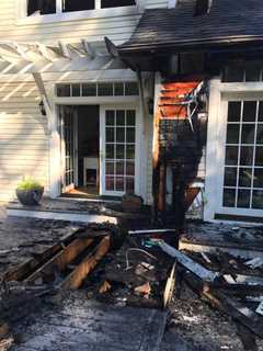 Firefighters Prevent Blaze From Spreading Through House In Bedford