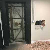 <p>The vault and the wall firefighters had to drill through to free the girl stuck inside.</p>