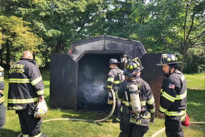 Monroe Volunteer Firefighters Extinguish Shed Fire