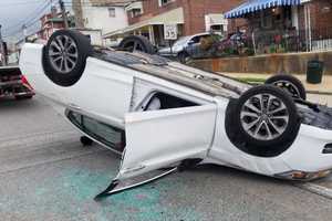 Car Overturns After Striking Parked Car In Delaware County