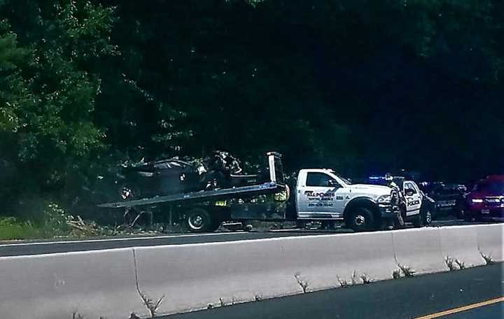 Route 208 northbound was temporarily closed while the vehicle was removed by flatbed truck.