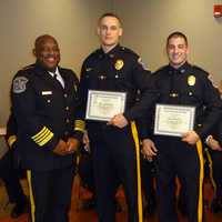 <p>Officers Joseph LaBarbera, Richard Maietta, and Sohrab Moussavian receiving their life-saving awards from Bergen County Sheriff Anthony Cureton.</p>