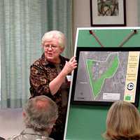 <p>Sister Lorelle Elcock, O.P., Prioress of the Dominican Sisters of Hope, unveils the land conservation easement at a Sept. 28 press conference</p>