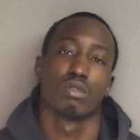 Man, 24, Caught With Stolen Gun At Burger Joint In Stamford, Police Say