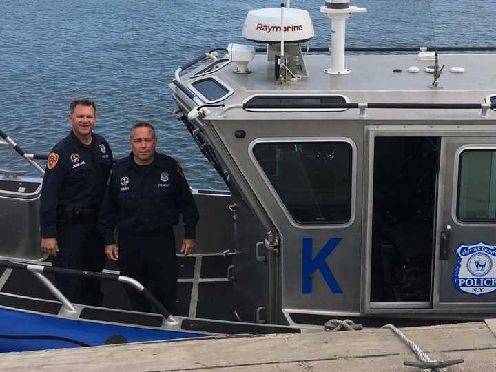 Suffolk County Police Officers Robert Jenkins and Raymond Cairo.