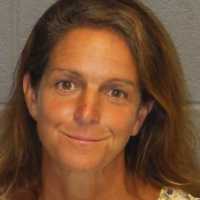 Woman, Man Accused Of Running Counterfeit CT, NY Scheme Involving Car Titles, Insurance Cards