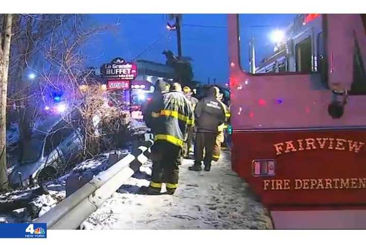 The vehicle would have careened down a steep embankment if it hadn’t hit the tree, police said.